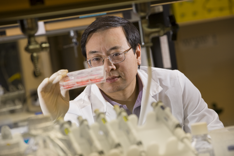 Dr. Lin Liu with test tubes